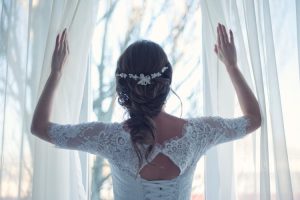 Beautiful bridal hairstyle with intricate details, perfect for a wedding day look.