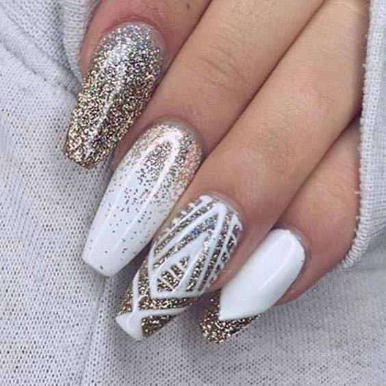 Creative nail art with white and gold