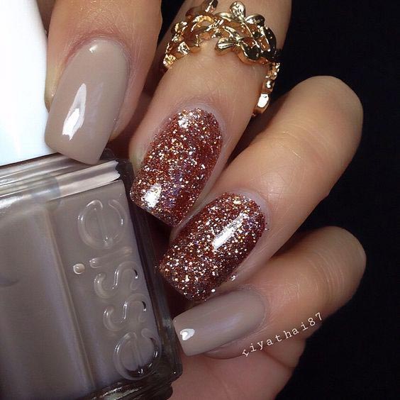 Nude shade party nails with glitter