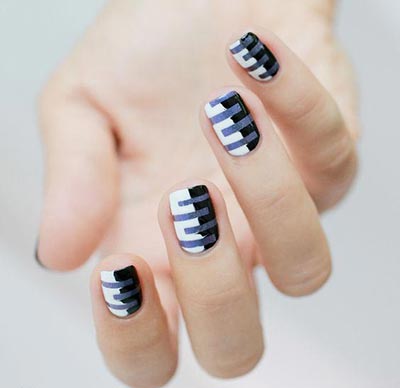 black and white striped nail art